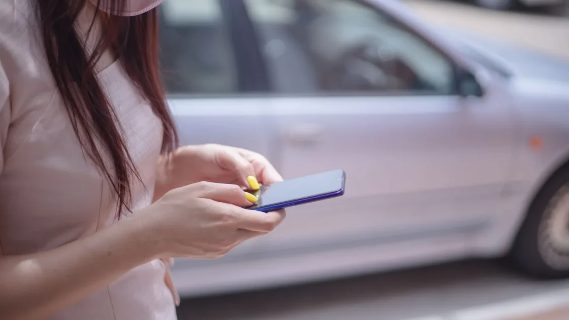 Carplay two phones shown in a real car